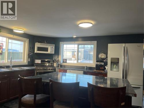 705 100A Avenue, Dawson Creek, BC - Indoor Photo Showing Kitchen With Double Sink