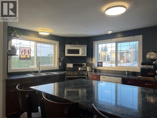 705 100A Avenue, Dawson Creek, BC - Indoor Photo Showing Kitchen With Double Sink