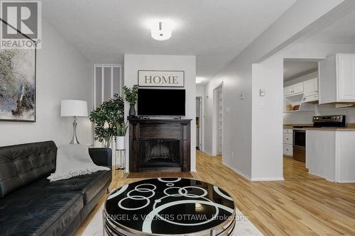 116 - 3445 Uplands Drive, Ottawa, ON - Indoor Photo Showing Other Room With Fireplace