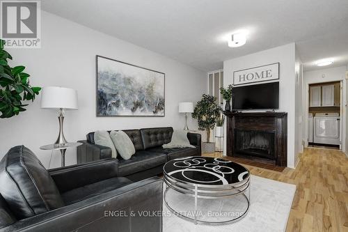 116 - 3445 Uplands Drive, Ottawa, ON - Indoor Photo Showing Living Room With Fireplace