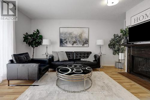 116 - 3445 Uplands Drive, Ottawa, ON - Indoor Photo Showing Living Room With Fireplace