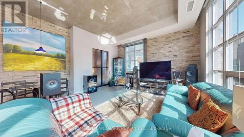 712 - 23 Brant Street, Toronto, ON - Indoor Photo Showing Living Room With Fireplace