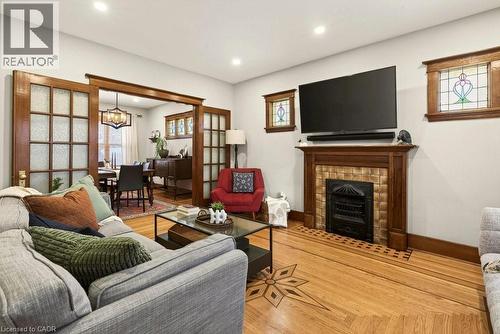 22 Mill Street, Hamilton, ON - Indoor Photo Showing Living Room With Fireplace