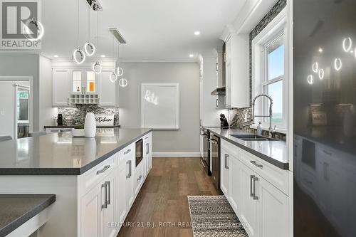 3510 Brennan Line W, Severn, ON - Indoor Photo Showing Kitchen With Double Sink With Upgraded Kitchen