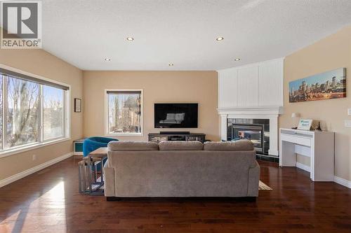 157 Hidden Creek Road Nw, Calgary, AB - Indoor Photo Showing Living Room With Fireplace
