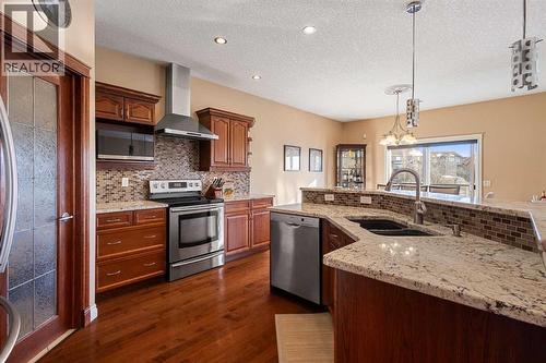 157 Hidden Creek Road Nw, Calgary, AB - Indoor Photo Showing Kitchen With Stainless Steel Kitchen With Double Sink With Upgraded Kitchen