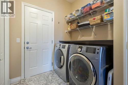157 Hidden Creek Road Nw, Calgary, AB - Indoor Photo Showing Laundry Room