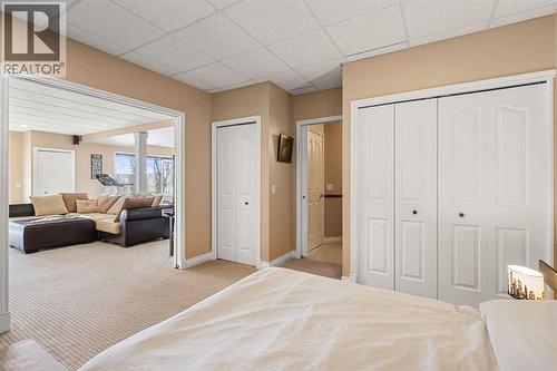 157 Hidden Creek Road Nw, Calgary, AB - Indoor Photo Showing Bedroom