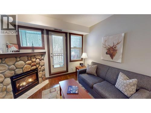 1500 Mcdonald Avenue Unit# 122, Fernie, BC - Indoor Photo Showing Living Room With Fireplace