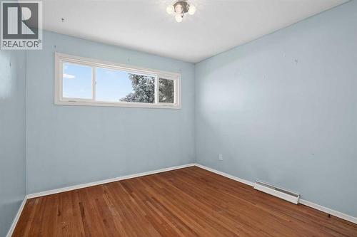 44 Winslow Crescent Sw, Calgary, AB - Indoor Photo Showing Other Room