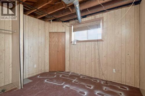 44 Winslow Crescent Sw, Calgary, AB - Indoor Photo Showing Basement
