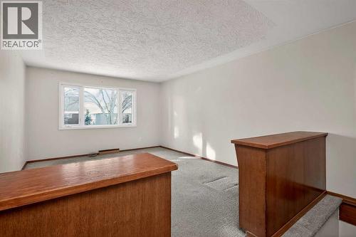 44 Winslow Crescent Sw, Calgary, AB - Indoor Photo Showing Other Room