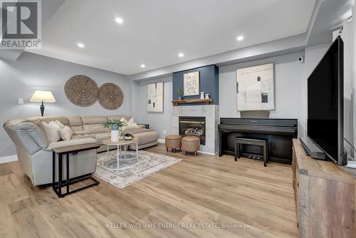 128 West Side Drive, Clarington (Bowmanville), ON - Indoor Photo Showing Living Room With Fireplace