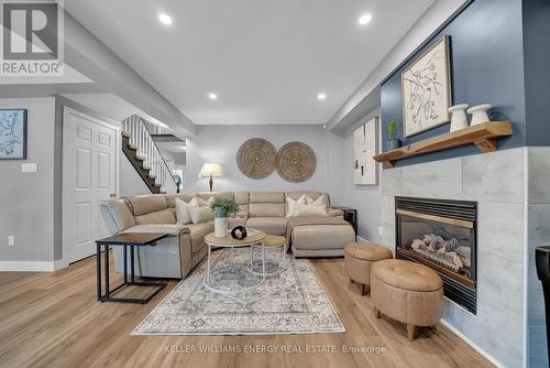 128 West Side Drive, Clarington (Bowmanville), ON - Indoor Photo Showing Living Room With Fireplace