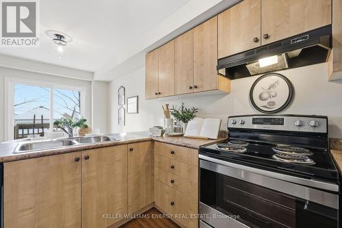 23 - 1280 Harmony Road N, Oshawa (Pinecrest), ON - Indoor Photo Showing Kitchen With Double Sink