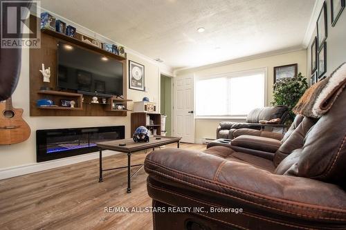 1412 7A Highway, Kawartha Lakes (Manvers), ON - Indoor Photo Showing Living Room With Fireplace