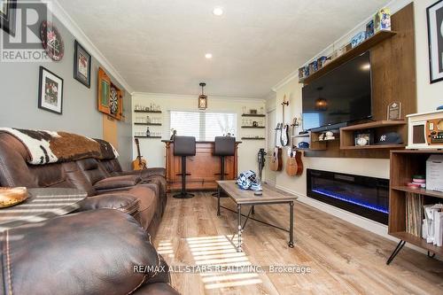 1412 7A Highway, Kawartha Lakes (Manvers), ON - Indoor Photo Showing Living Room With Fireplace
