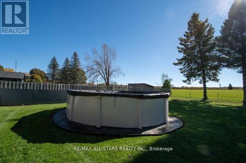 1412 7A Highway, Kawartha Lakes (Manvers), ON - Outdoor With Above Ground Pool With Backyard