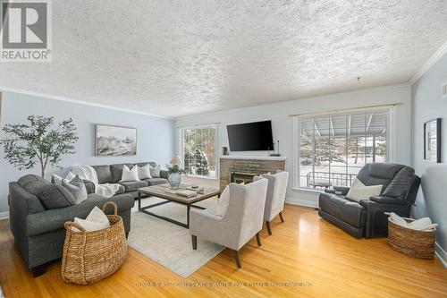 420 Riverside Drive, London North (North N), ON - Indoor Photo Showing Living Room With Fireplace