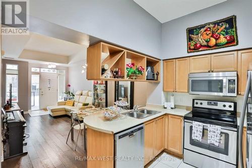 Gv-108 - 330 Princess Royal Drive, Mississauga, ON - Indoor Photo Showing Kitchen With Double Sink