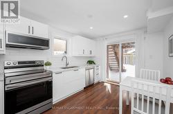 Apartment Kitchen - walkout to patio - 