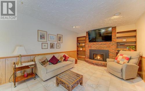 32 Brookview Court, Kitchener, ON - Indoor Photo Showing Living Room With Fireplace