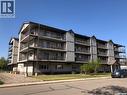 205 701 Henry Street, Estevan, SK  - Outdoor With Facade 