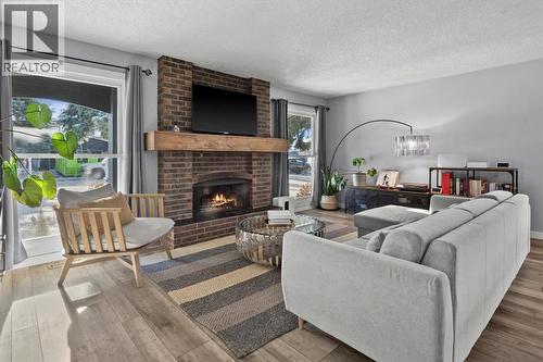 136 Parkglen Crescent Se, Calgary, AB - Indoor Photo Showing Living Room With Fireplace