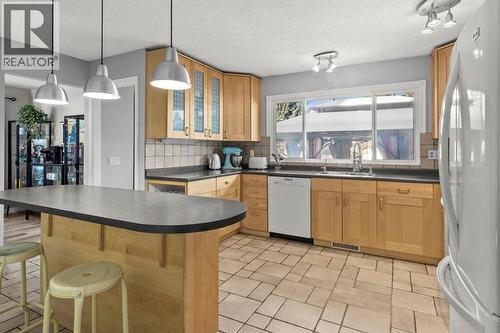 136 Parkglen Crescent Se, Calgary, AB - Indoor Photo Showing Kitchen With Double Sink