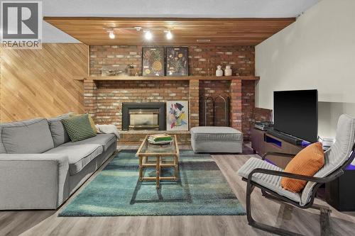 136 Parkglen Crescent Se, Calgary, AB - Indoor Photo Showing Living Room With Fireplace