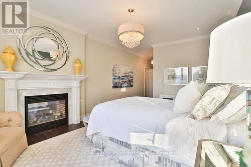 12 - 3353 Liptay Avenue, Oakville (Bc Bronte Creek), ON - Indoor Photo Showing Bedroom With Fireplace