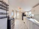 852 5Th Street, Brandon, MB  - Indoor Photo Showing Kitchen With Double Sink 