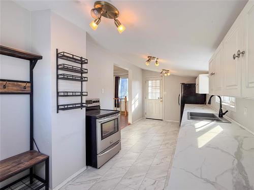 852 5Th Street, Brandon, MB - Indoor Photo Showing Kitchen With Double Sink
