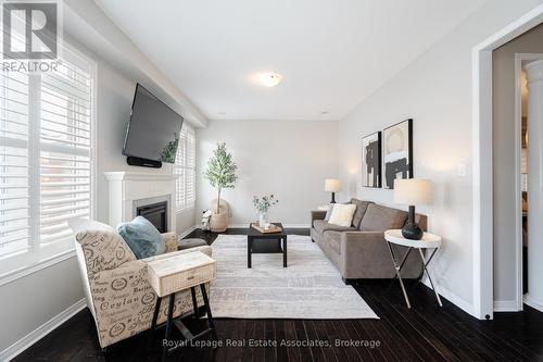 39 Wildflower Lane, Halton Hills, ON - Indoor Photo Showing Living Room With Fireplace