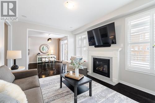 39 Wildflower Lane, Halton Hills, ON - Indoor Photo Showing Living Room With Fireplace