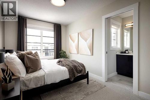 17 Amblefield View Nw, Calgary, AB - Indoor Photo Showing Bedroom