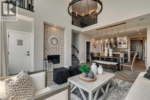 182 Setonstone Green Se, Calgary, AB - Indoor Photo Showing Living Room With Fireplace
