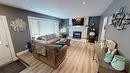304 30Th Avenue, Cranbrook, BC  - Indoor Photo Showing Living Room With Fireplace 