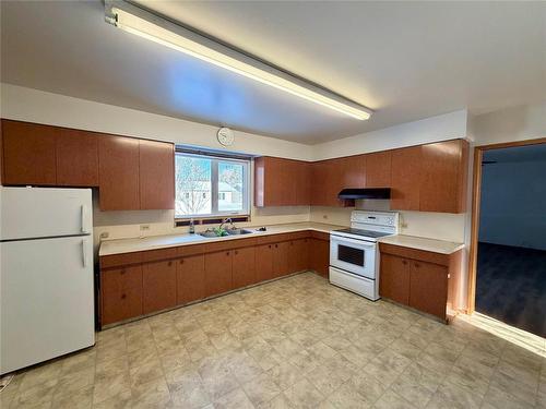 118 Wright Avenue E, Angusville, MB - Indoor Photo Showing Kitchen With Double Sink