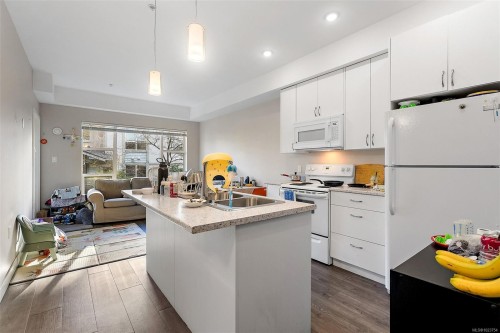 301-1018 Inverness Rd, Saanich, BC - Indoor Photo Showing Kitchen With Double Sink