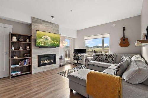 402-2500 Hackett Cres, Central Saanich, BC - Indoor Photo Showing Living Room With Fireplace
