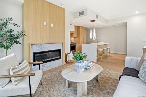 306-5229 Cordova Bay Rd, Saanich, BC - Indoor Photo Showing Living Room With Fireplace