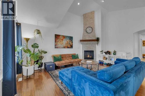 18 Lampard Crescent, Red Deer, AB - Indoor Photo Showing Living Room With Fireplace