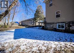 View of yard layered in snow - 