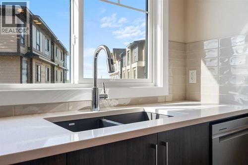 72, 285 Chelsea Court, Chestermere, AB - Indoor Photo Showing Kitchen With Double Sink