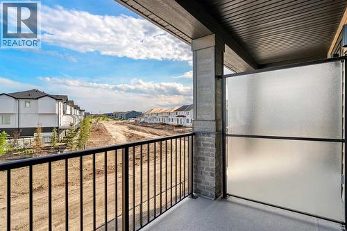 72, 285 Chelsea Court, Chestermere, AB - Outdoor With Balcony With Exterior