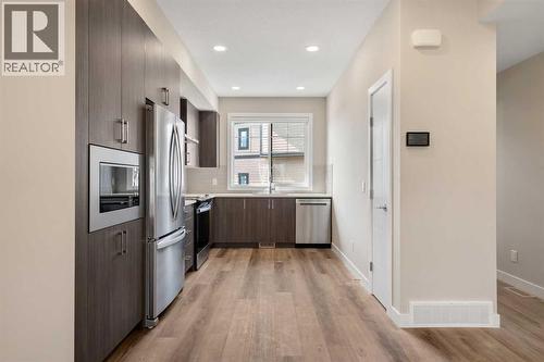 72, 285 Chelsea Court, Chestermere, AB - Indoor Photo Showing Kitchen With Stainless Steel Kitchen