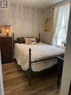 Seller picture of 2nd bedroom on Main Floor. - 