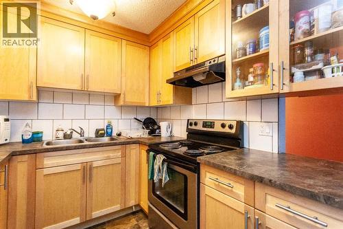 207B, 295 Columbia Boulevard W, Lethbridge, AB - Indoor Photo Showing Kitchen With Double Sink