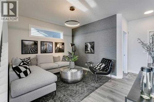 499 Lawthorn Way Se, Airdrie, AB - Indoor Photo Showing Living Room